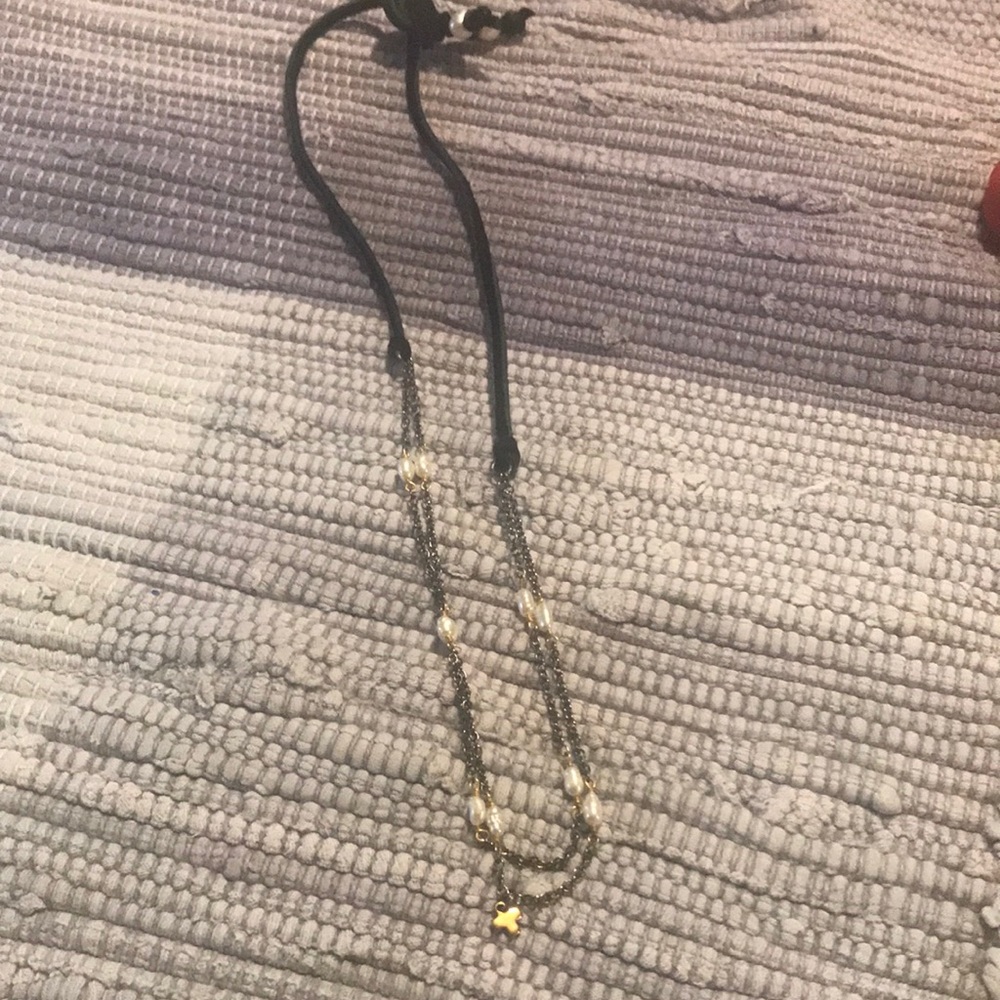 Necklace made of black felt. Delicate chains with tiny pearls and small cross